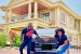 Funke Akindele and hubby JJC Skillz pose with his new SUV