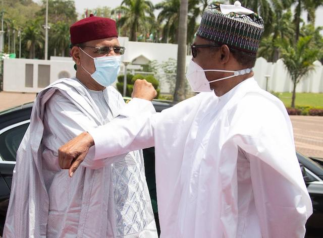 Bazoum in elbow shake with Buhari on arrival 