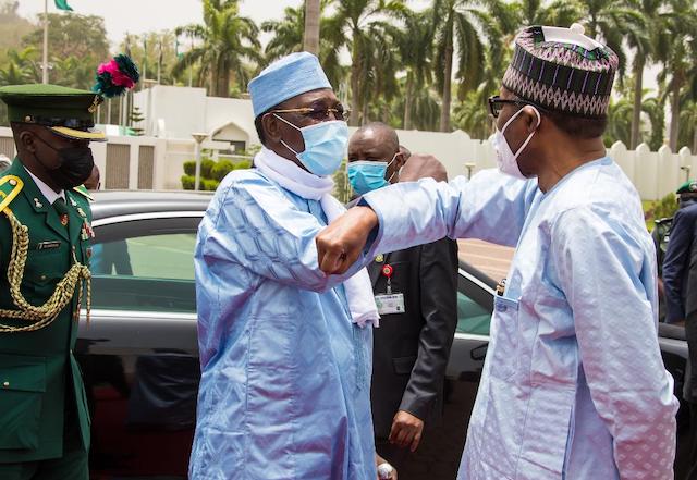 Bye for now: Idriss Deby seemed to say to President Buhari