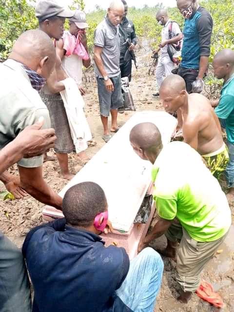 The remains of Prince Deeka, Chairman Community Development Committee, CDC, of Kereken-Boue, in Gokana local government area of Rivers being taken away in a coffin after it was exhumed