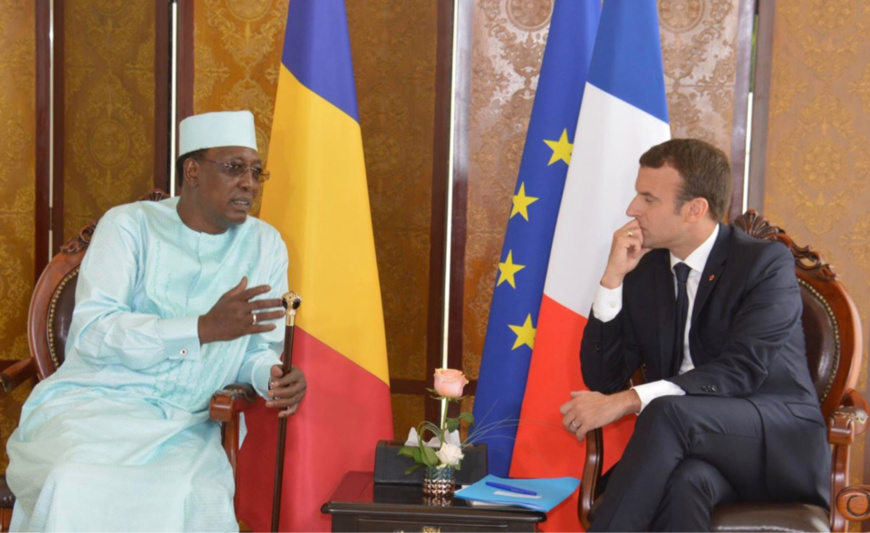 Macron, right and Idriss Deby, when alive