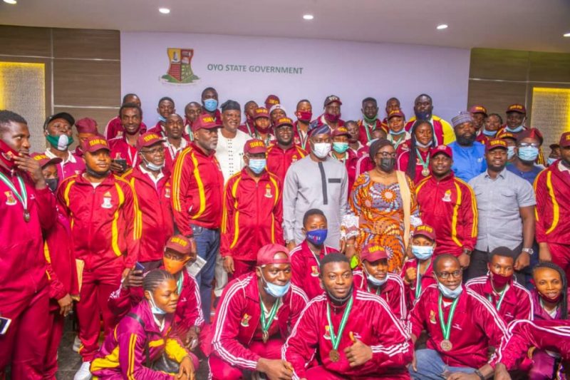 Governor Seyi Makinde (middle) with sports officials and athletes who participated in the National Sports Festival.