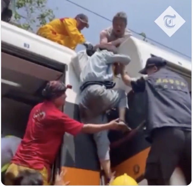 Rescue effort on a Taiwan train that crashed Friday