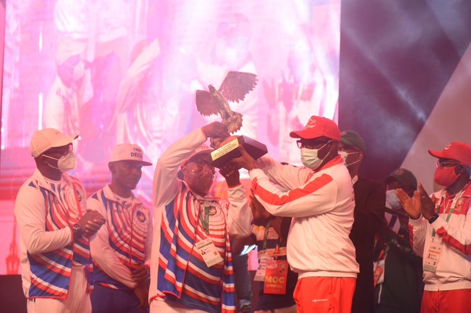 Champion Delta receives the trophy for winning 2020 National Sports Festival