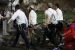 the dead being carried away by medics at Mount Meron Israel on Friday