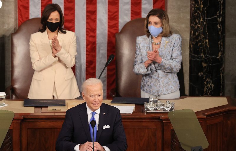 VP Kamala Harris and Speaker Nancy Pelosi cheer President Biden