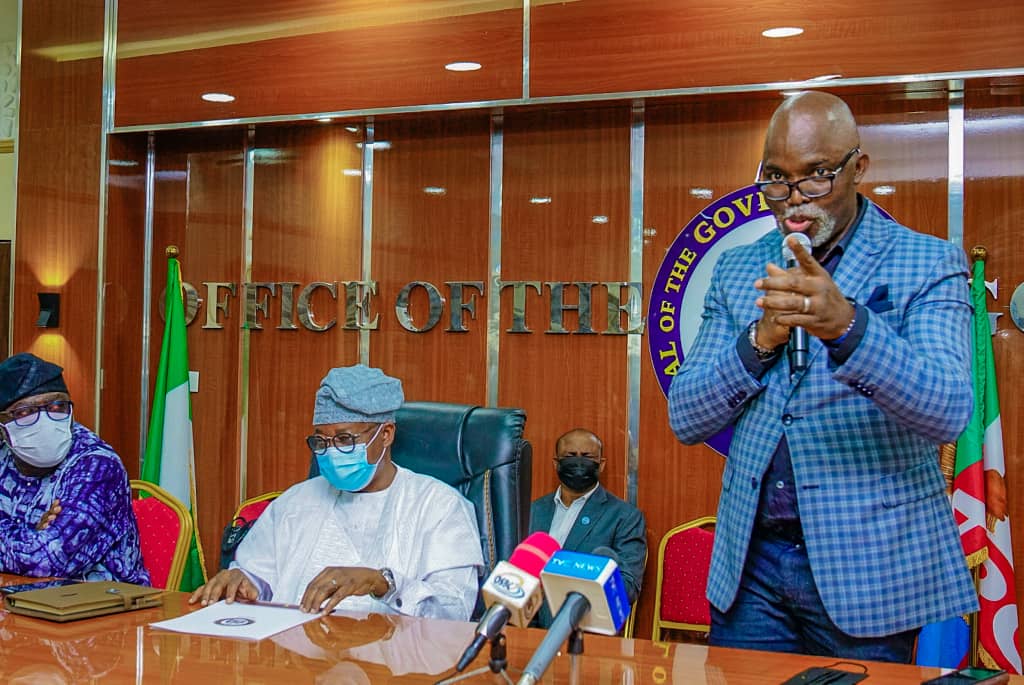 Governor Adegboyega Oyetola and NFF President, Amaju Pinnick