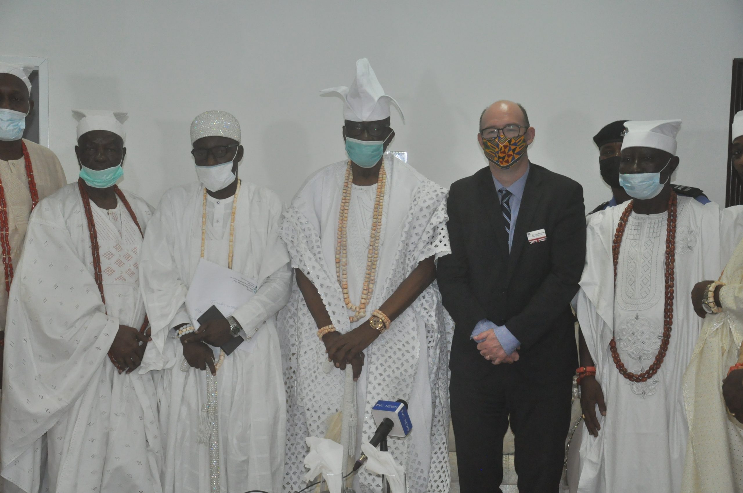 Oba of Lagos, HRM Babatunde Akiolu, British Deputy High Commissioner, Ben Llewellyn-Jones and White Cap Chiefs during the courtesy visit of the Commissioner to Iga Idunganran Palace.