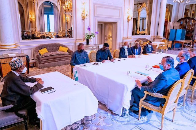 Buhari at a meeting with Total delegation led by CEO Pouyanne