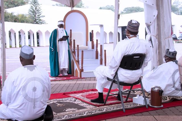 Buhari listens to the sermon by Imam Sulaiman