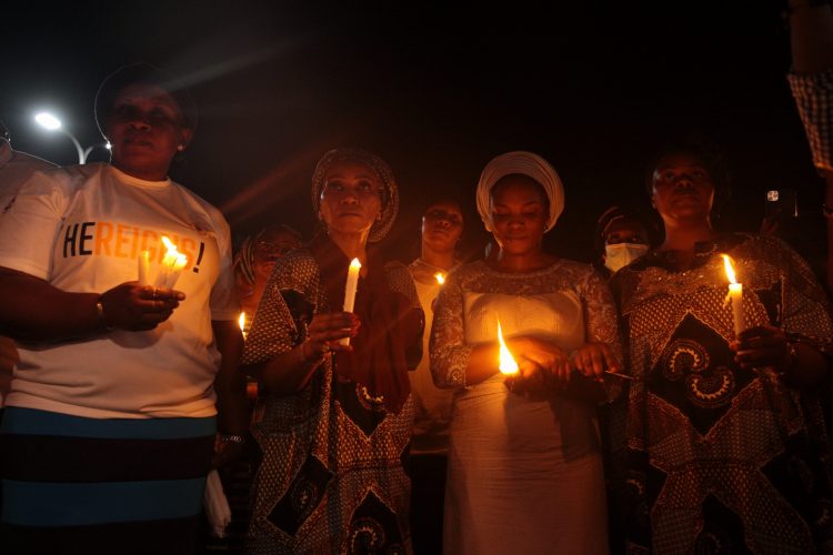 Dare's wife Temitope during the candlelight procession