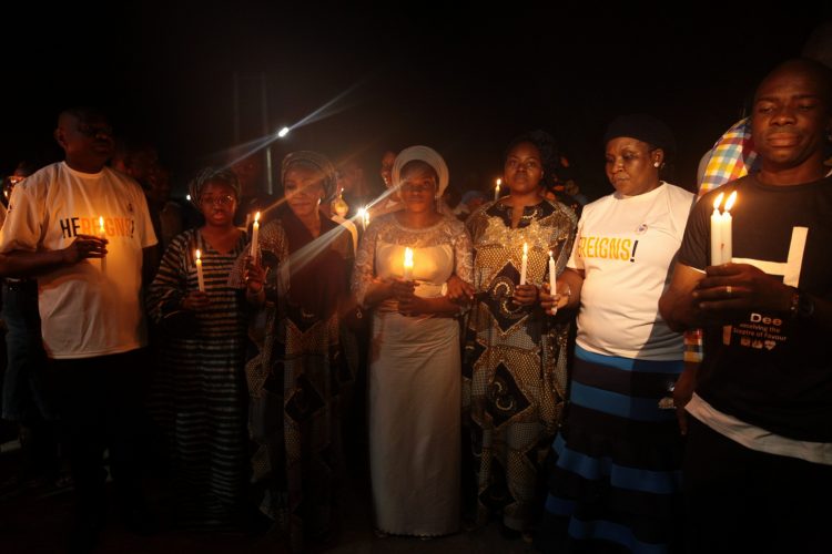 Dare's wife Temitope during the candlelight procession