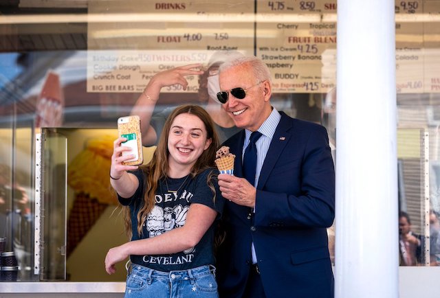 Chocolate ice cream in hand, Biden even posed for some selfies