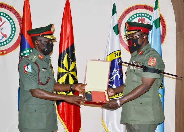 General Irabor hands over instrument of office to Yahaya, right