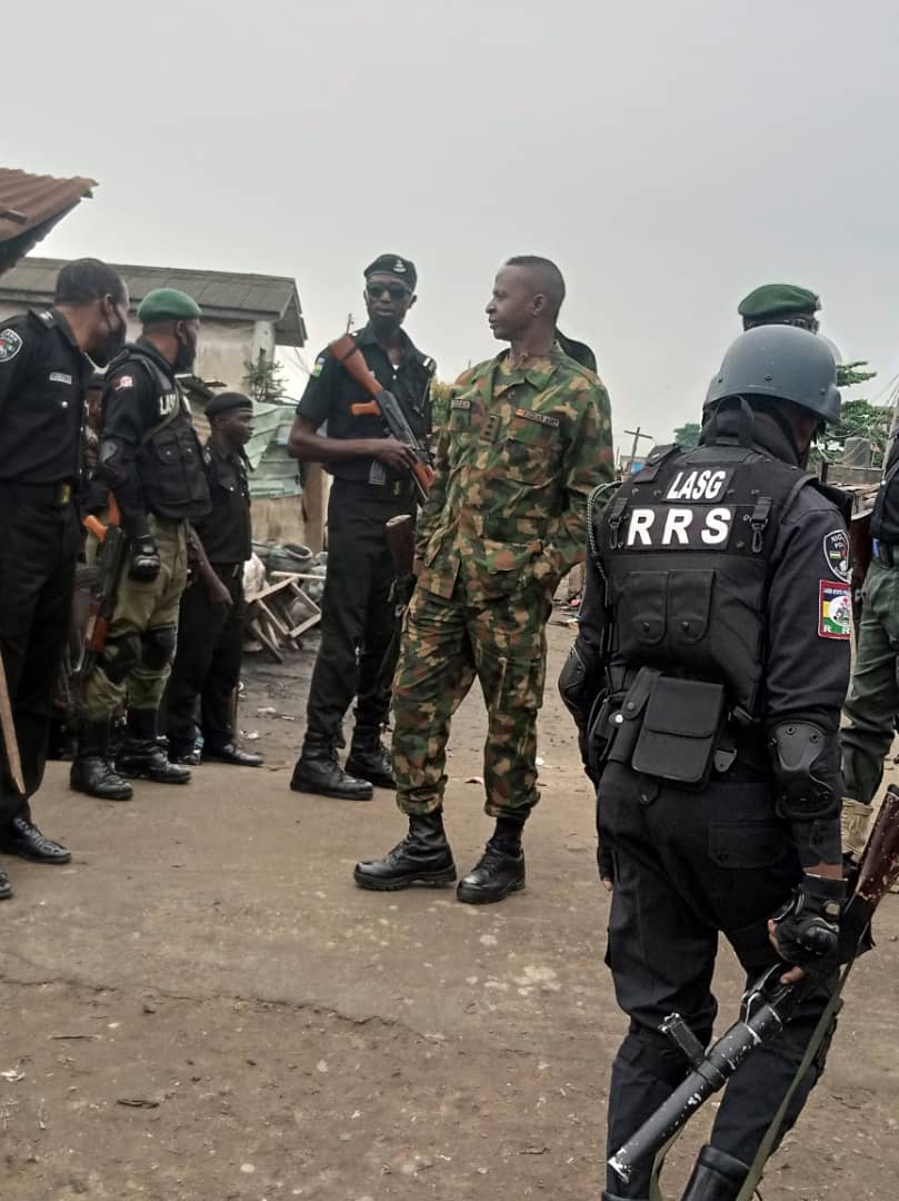 Operatives of the Lagos State Rapid Response Squad (RRS) on ground to restore normalcy in Mile 12 on Thursday.