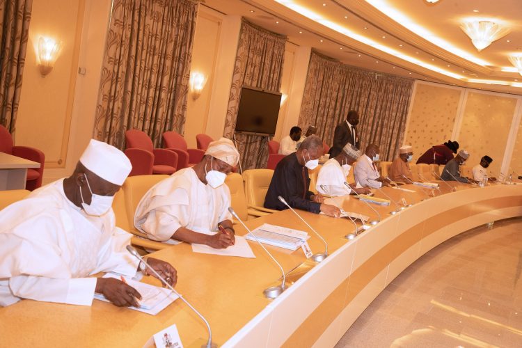 Buhari presides over security meeting in Abuja. PHOTO; SUNDAY AGHAEZE.