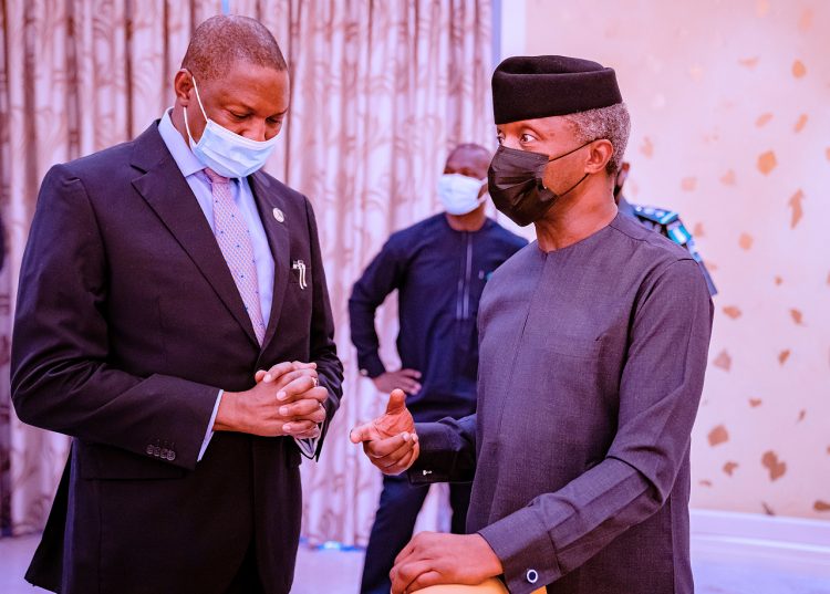 Osinbajo with Abubakar Malami at the security council meeting