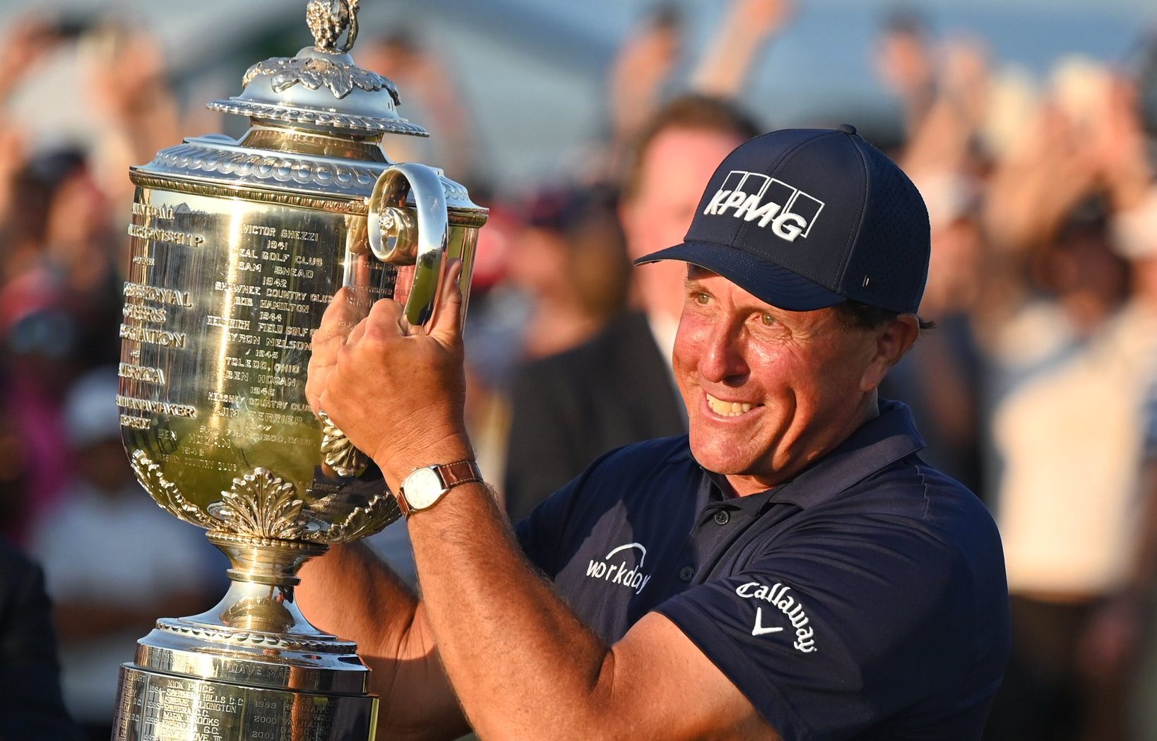 Phil Mickelson with the PGA Tour championship trophy