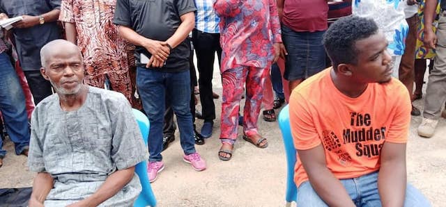 Uduak Frank Akpan, right with his father