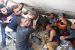rescuers pull a girl from the rubble after Israeli air strike in Gaza
