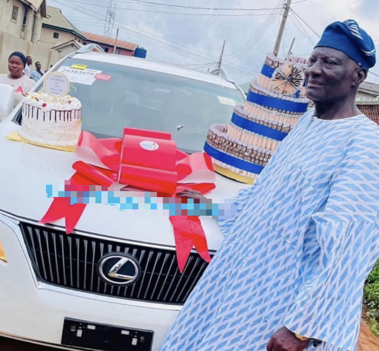 Bobrisky's father with his car