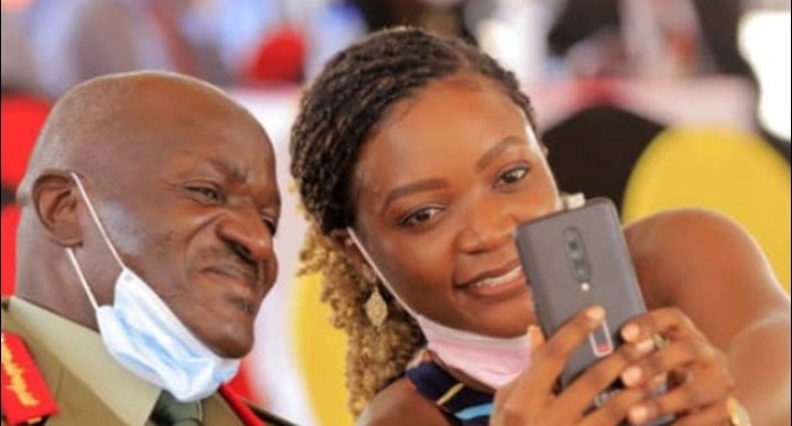 Brenda Wamala taking a selfie with her dad at the inauguration of the 11th Uganda parliament recently
