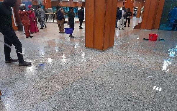 Buckets used to collect rain water at the National Assembly