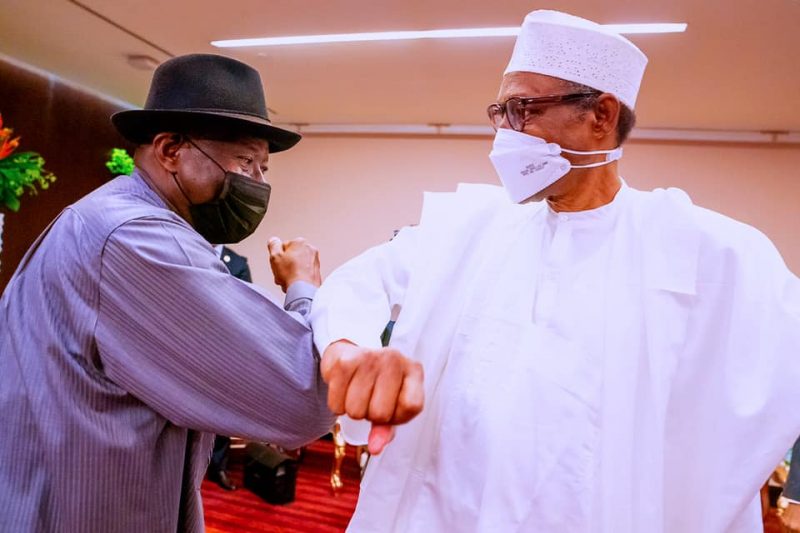 Buhari greets Goodluck Jonathan at the ECOWAS summit in Accra