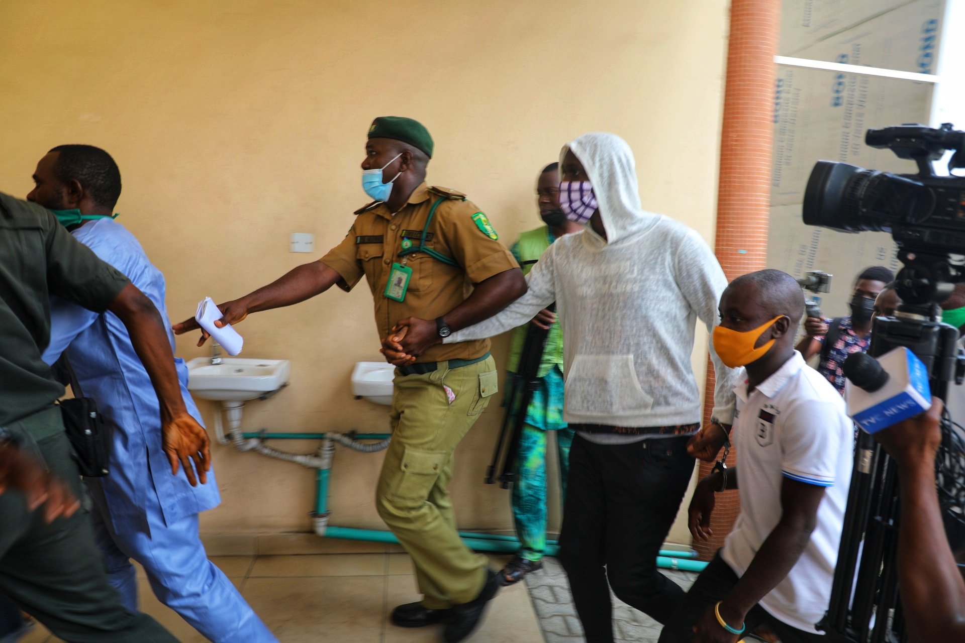Baba Ijesha was dragged into the court by a prison warder to avoid pressmen and supporters