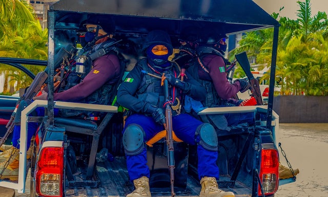 Some female NSCDC combatants in a patrol vehicle