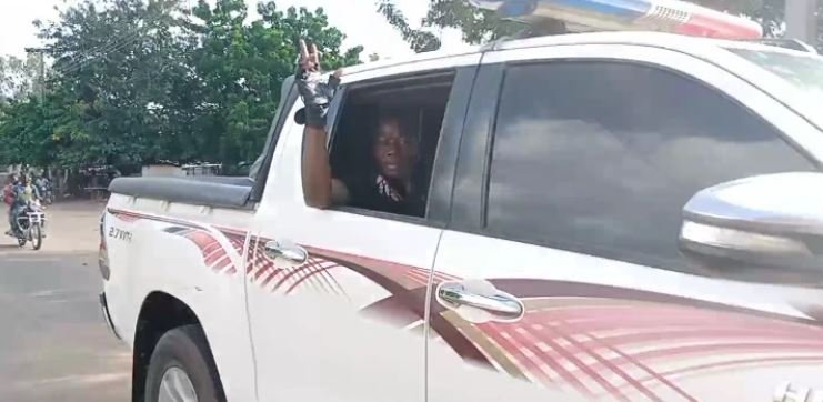 Sunday Igboho waves from a Toyota Hilux vehicle in Igangan