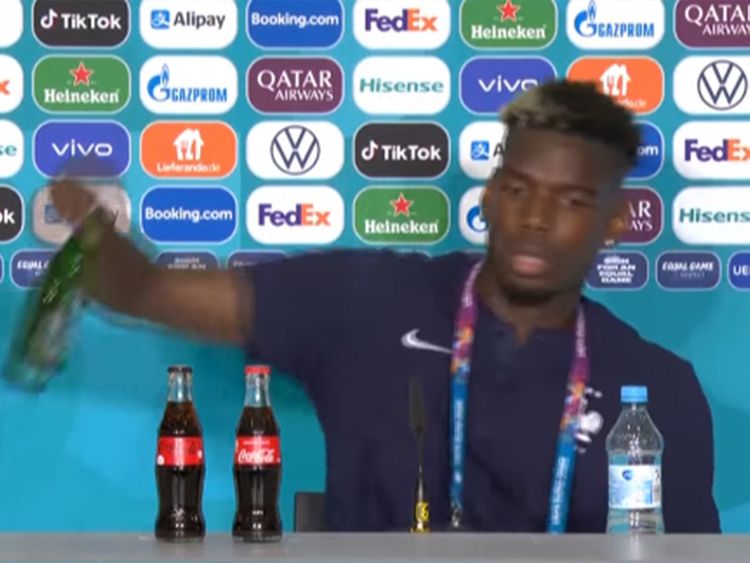 Pogba removes Heinekens beer from his press conference table