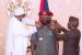 Buhari and Osinbajo decorate Lt. General Faruk Yahaya, chief of army staff