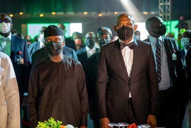 VP Yemi Osinbajo and Chairman Transcorps Hotels Plc at the launch of Aura app