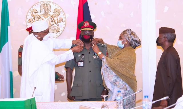 Yahaya gets his epaulets from Buhari and Salamatu