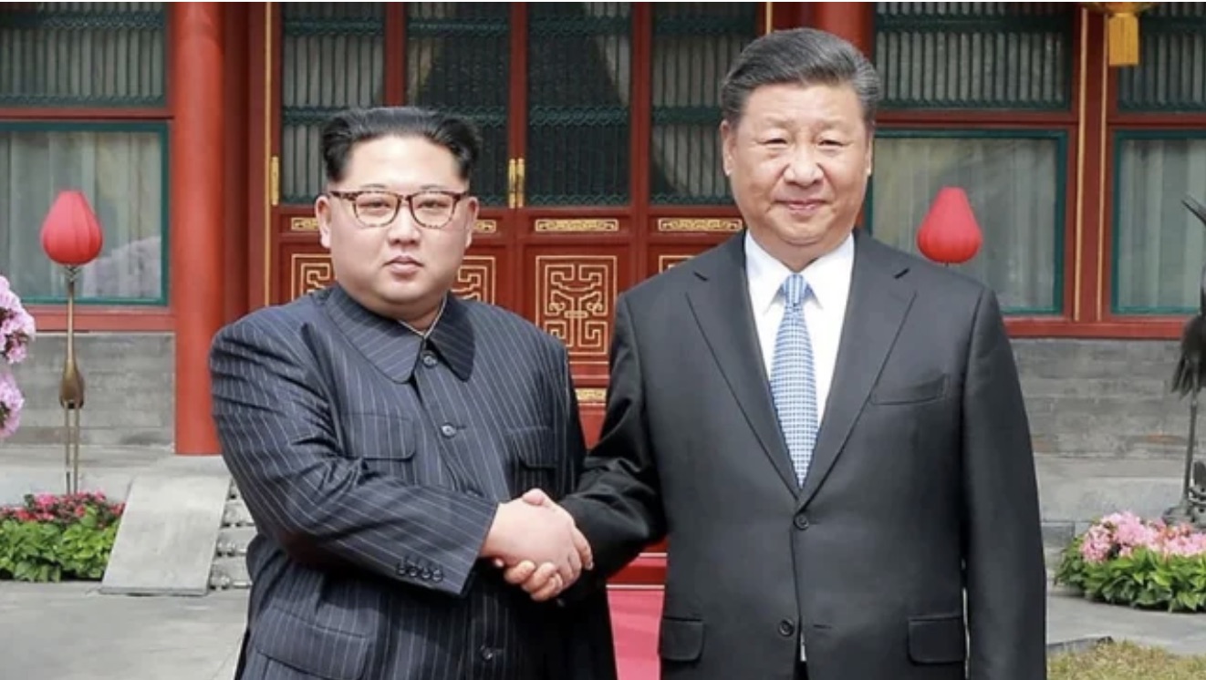 Kim Jong Un and Xi Jinping vow cooperation against foreign forces