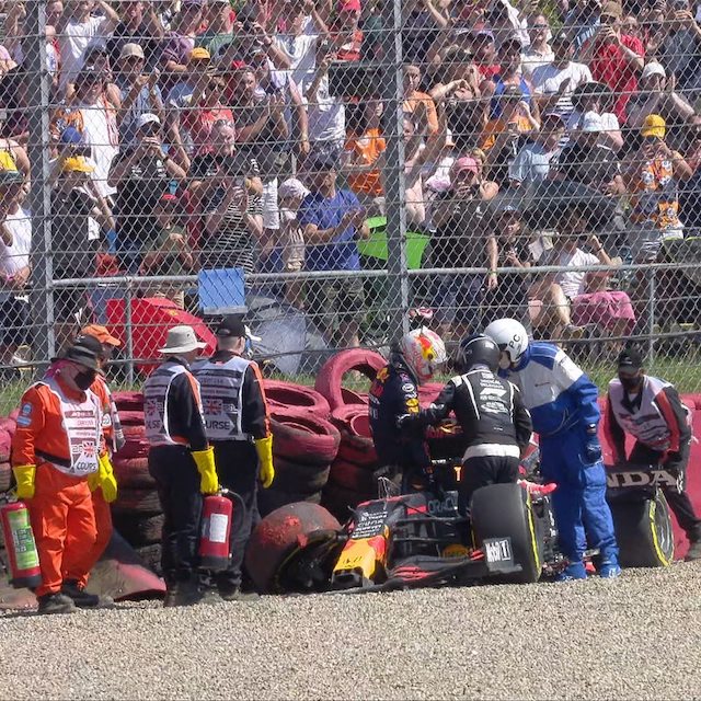Max Verstappen being helped out of his crashed car at British Grand Prix