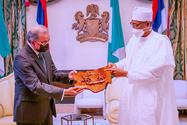 Buhari presents a gift to Ambassador Trabelsi