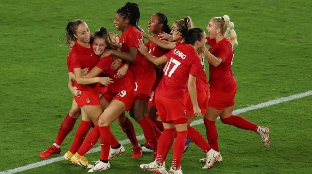 Canadian women rejoice after winning the gold medal in football