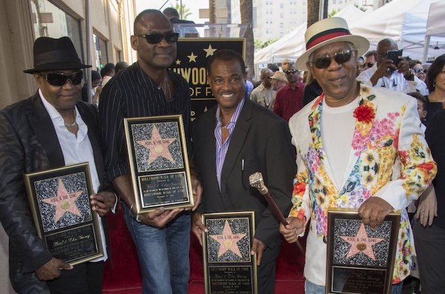 Dennis Thomas, right, poses with other 'Gang' members after receiving the 2,560th star on the Hollywood Walk of Fame in 2015.