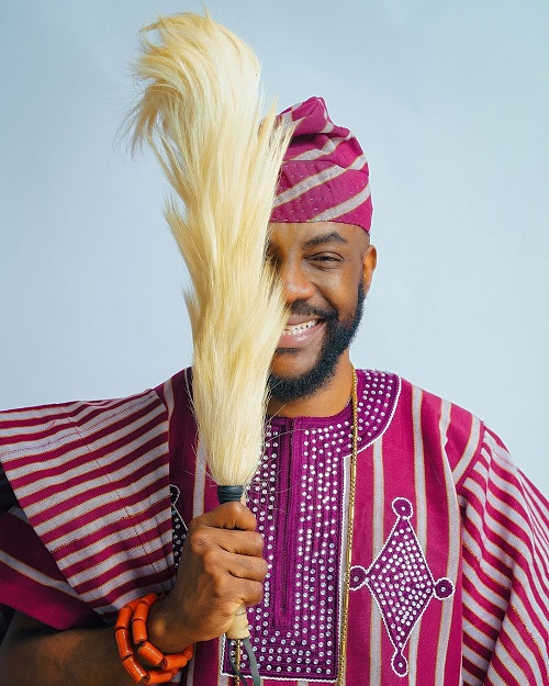 Ebuka poses with a Horsetail-fly-whisk known as 'Irukere' by the Yoruba people.