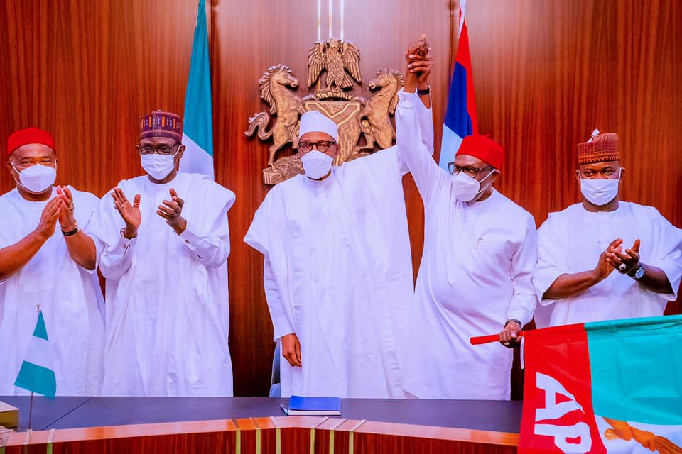 Anambra governorship poll: Buhari presents APC flag to Andy Uba