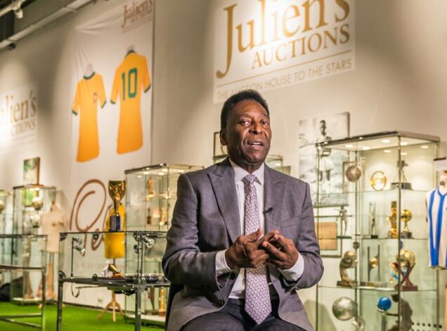 Julien auctions with Pele in 2016