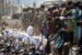 Thousands of Afghans at the gate of Kabul Airport.