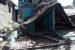 a house Knocked down by earthquake in Haiti