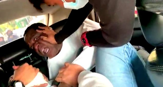 Nigerian-Diplomat Ibrahim being assaulted by Indonesian immigration officials