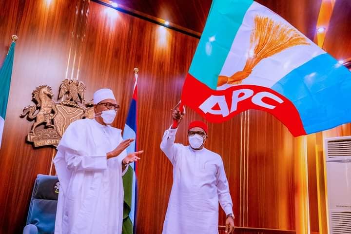 President Buhari after handing the APC flag to Senator Andy Uba