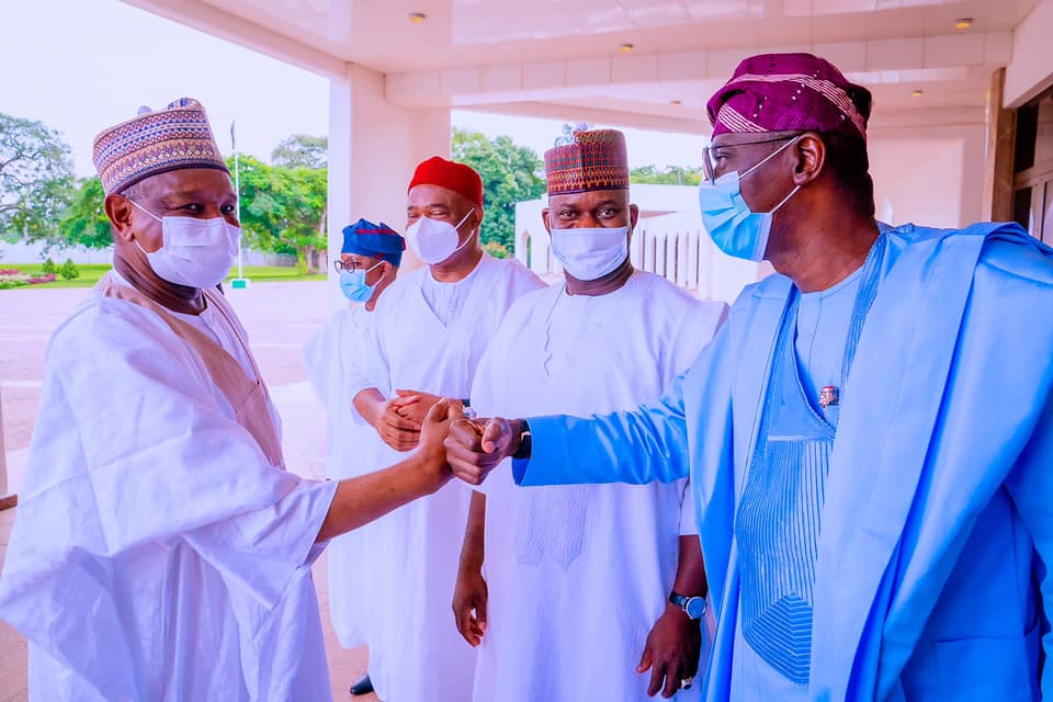 Anambra governorship poll: Buhari presents APC flag to Andy Uba