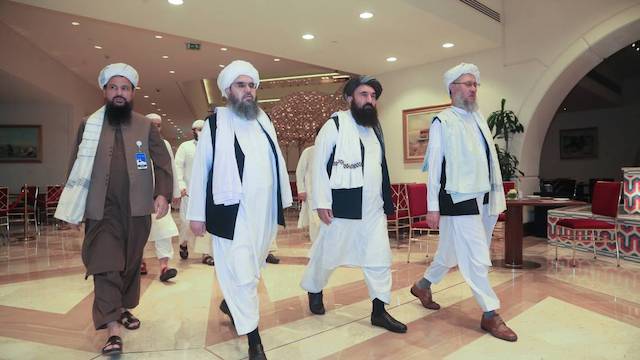 Taliban delegates at a peace talk in Doha Qatar on 12 August