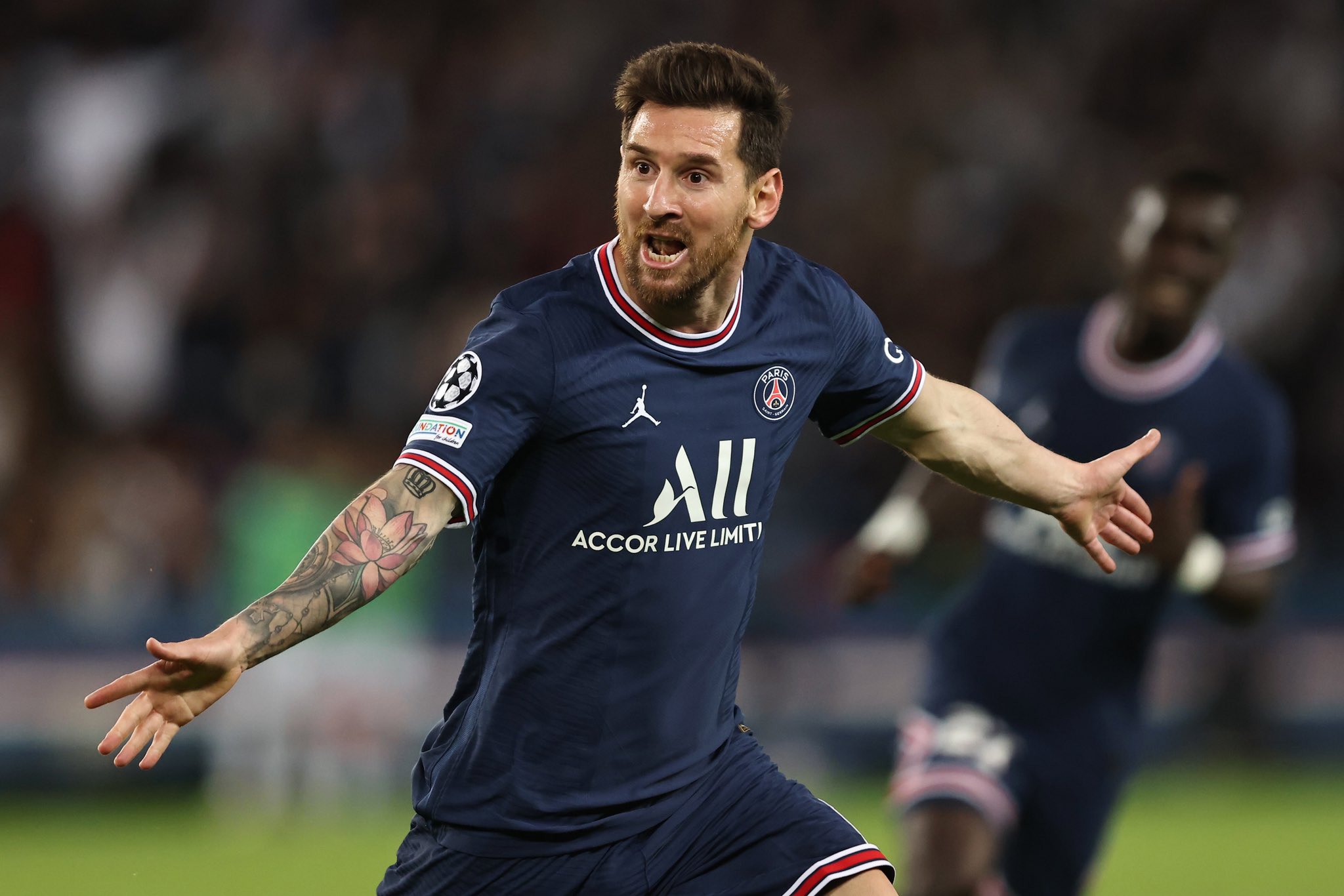 Paris Saint-Germain's Argentinian forward Lionel Messi celebrates after scoring his team's second goal during the UEFA Champions League first round group A football match between Paris Saint-Germain's (PSG) and Manchester City